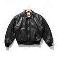 Black leather jacket on a hanger against a white background