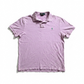 Purple polo shirt with a brand logo on