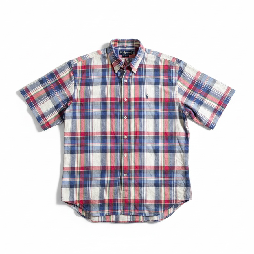 A short-sleeve button-up plaid shirt by Polo Ralph Lauren, featuring a red, blue, and white tartan pattern on a white background.
