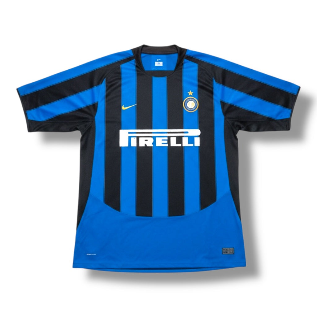 A blue and black striped Inter Milan soccer jersey with a white Pirelli sponsor logo on the chest, a Nike swoosh, and the Inter Milan club crest.