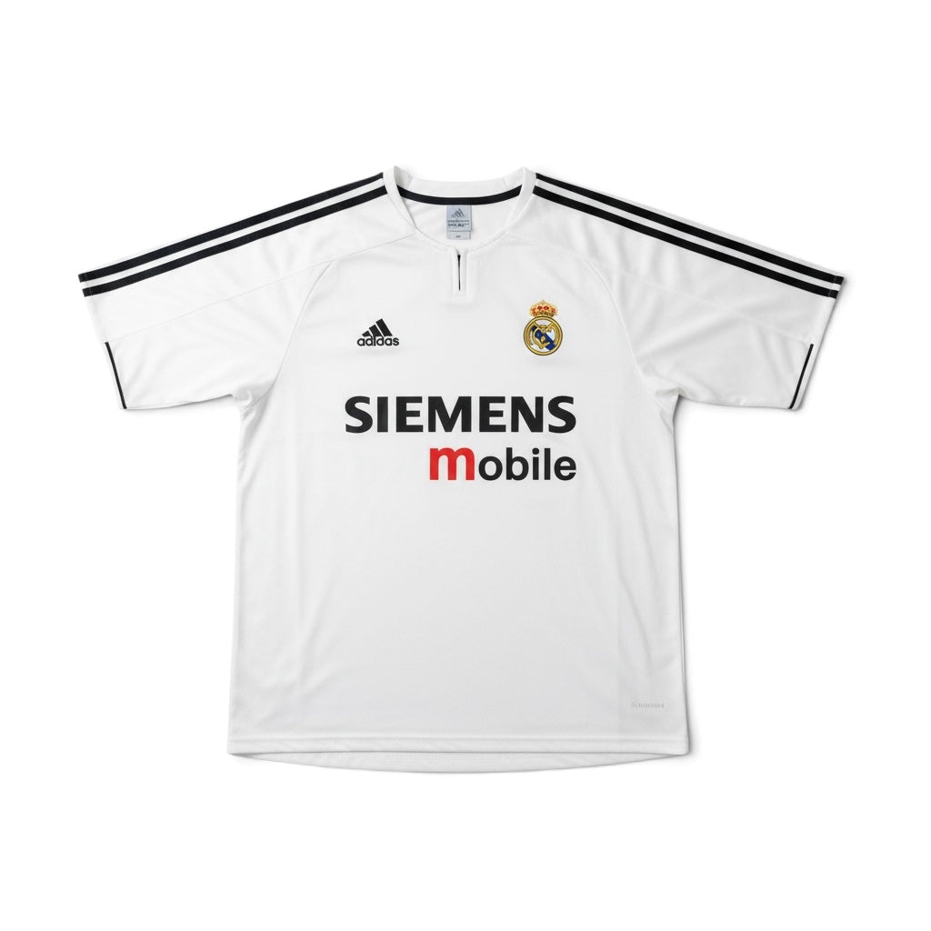 A white Real Madrid soccer jersey by Adidas, featuring black three-stripes on the shoulders, a black zipper at the collar, the Adidas logo on the right chest, the Real Madrid crest on the left chest, and 'SIEMENS mobile' printed across the front.