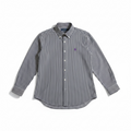 A long-sleeve button-down shirt with vertical navy and white stripes, featuring a small embroidered polo player logo on the left chest, displayed on a clean white background.